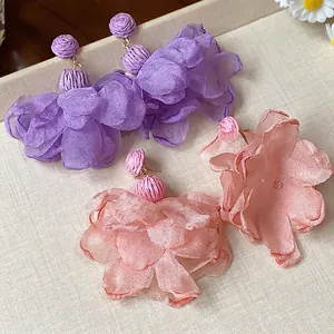Handmade raffia and chiffon flower drop earrings in purple and peach for summer
