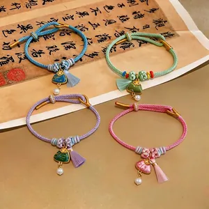 Hand-woven five-color rope bracelets with Zongzi charms for Dragon Boat Festival