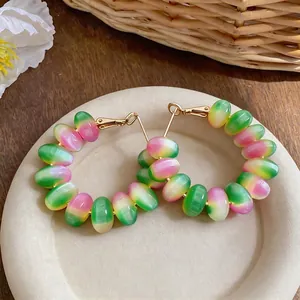 Macaron gradient beaded hoop earrings with gold-tone finish and minimalist style
