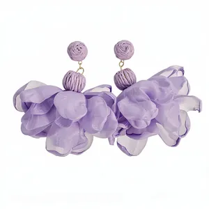 Elegant purple chiffon flower earrings with raffia studs for a chic vacation look