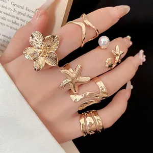 Élégant ensemble de 6 bagues dorées vintage avec perle fleur et motif étoile de mer