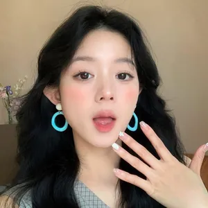 Bright dopamine blue hoop earrings in retro style for beach vacation and daily wear