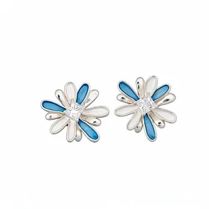 Elegant silver flower stud earrings with blue enamel petals and square zircon stone
