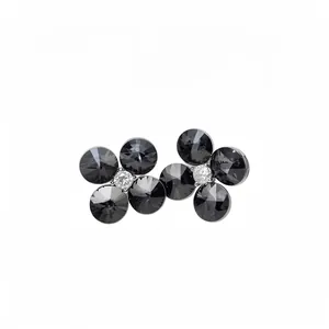 Elegant floral stud earrings featuring black faceted crystals and central zircons