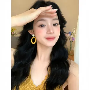 Vibrant yellow dopamine style hoop earrings for women, perfect for beach vacation look.