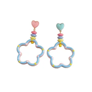 Sweet pastel dopamine-style hollow flower dangle earrings with cute heart studs for women