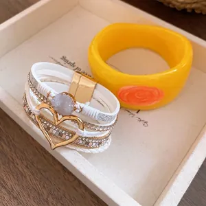 Elegant yellow resin bangle and white multi-layer heart charm bracelet set for women