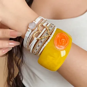Bohemian layered resin bangle set with yellow drip oil flower and white leather bracelets