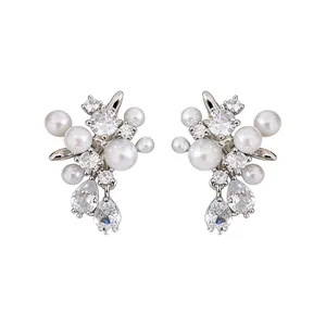 Elegant silver-tone cluster earrings with white pearls and teardrop zirconia crystals