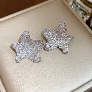 Elegant sparkling star stud earrings with baguette-cut zircons and S925 silver needles