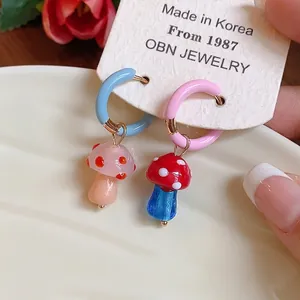 Handmade colorful glass mushroom hoop earrings with asymmetric design for a unique look