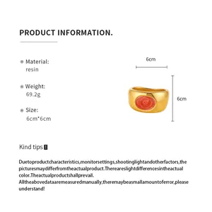 Product dimensions and material details for the golden resin rose bangle bracelet.
