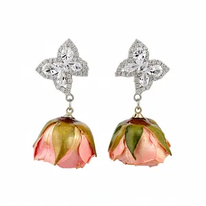Elegant silver needle butterfly zircon earrings with pink preserved rose flower drops