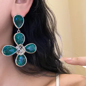 Vintage style emerald green teardrop flower dangle earrings with rose center