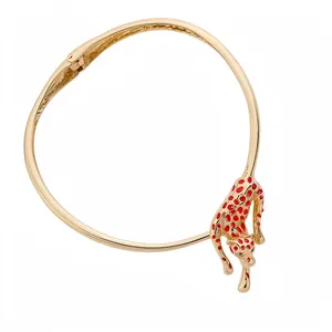 Elegant gold-tone leopard choker necklace with red enamel spots for a luxury statement look