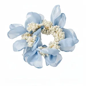 Elegant blue chiffon flower hair scrunchie decorated with white pearl embellishments