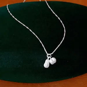 Elegant silver peanut pendant necklace with minimalist chain for women's daily wear