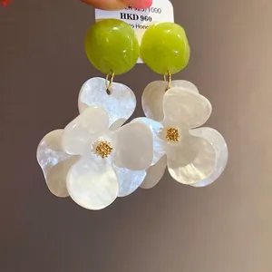 Elegant vacation style white flower drop earrings with green resin studs for women