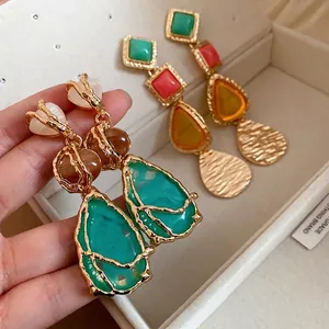 Vintage gold textured resin teardrop drop earrings in green and colorful palette
