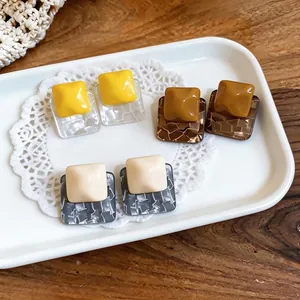 Chic pleated resin square stud earrings with silver needles in unique fashion colors