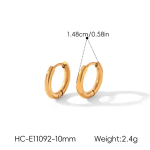 Detail view of gold hoop earrings with size 1.48cm and weight 2.4g parameters
