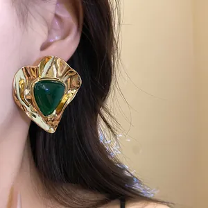 Vintage gold hammered metal stud earrings with green triangular resin stone for women