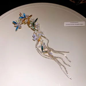 Exquisite detailed view of luxury zirconia flower ear cuff with sparkling long tassels