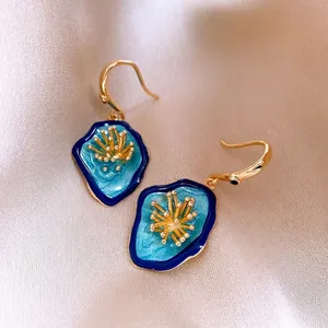 Elegant Monet Garden inspired blue enamel drop earrings with gold floral center details