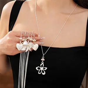 Elegant silver-tone necklace with heart and flower pendants for women