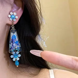 Elegant vintage blue resin flower dangle earrings with rhinestones in palace style