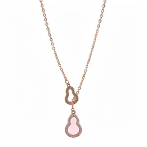 Elegant rose gold necklace featuring a pink zircon gourd pendant on white backdrop