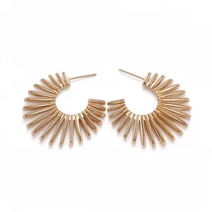 Vintage gold metallic C-shaped sunburst hoop earrings with sparkling rhinestone detail