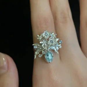 Macro view of a sweet style zircon flower vase ring with fine micro-inlaid details