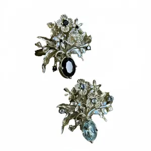 Elegant silver flower vase stud earrings with sparkling micro-set black and blue zircons