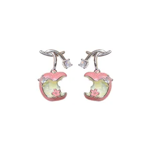 Elegant pink enamel apple stud earrings with shimmering zircon details for women