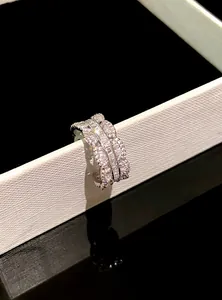 Detailed close-up shot of a sparkling silver-tone zircon lace open ring on a luxury display