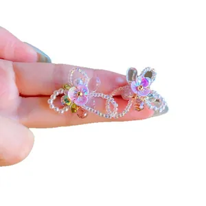 Handmade Y2K style colorful iridescent beaded flower hoop earrings for beach vacations