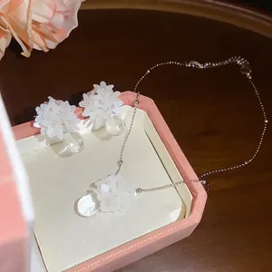 Elegant white resin flower necklace and earring set with stylish water-drop pendants for women