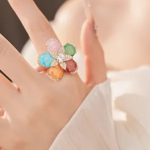 Close-up detail of an exquisite 18k gold plated flower ring with colorful zircon stones