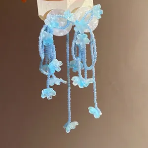 Blue resin flower tassel drop earrings with beaded fringe and silver needles for women