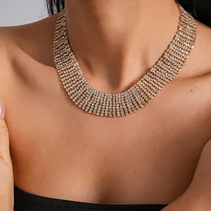 Close-up of elegant gold-tone multi-row rhinestone choker necklace on model