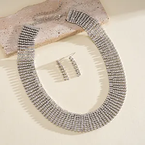 Luxury two-piece jewelry set with multi-strand rhinestone choker and fringe earrings