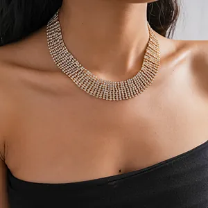 Close-up of exquisite multi-row rhinestone choker necklace worn by model.