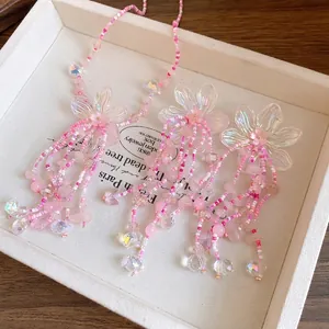 Elegante set di gioielli con collana e orecchini con nappe di perline a fiori rosa da donna