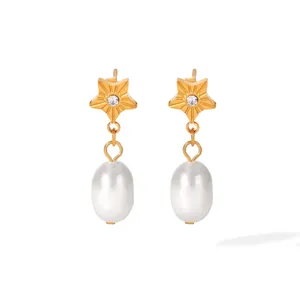 Close-up view of elegant gold-plated stainless steel star stud earrings with pearls