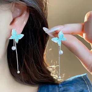 Elegant silver needle butterfly tassel pearl earrings featuring a sweet summer style