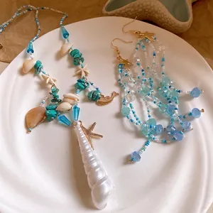 Sea themed starfish beaded necklace and earrings set for summer beach vacations.