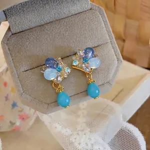 Vintage French style blue water-drop clip-on earrings with luxury diamond-encrusted details
