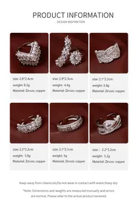 Detail view showing six vintage zircon rings with size and weight specifications.