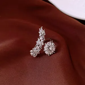 Close-up of elegant marquise cut crystal flower ring in silver finish for women